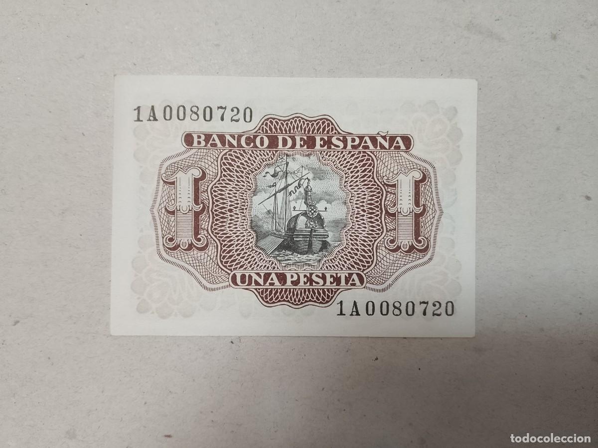 Billetes espa&ntilde;oles: 1 pts 1953 serie 1A0080720, letra compuesta, n&uacute;mero bajisimo, sc/plancha