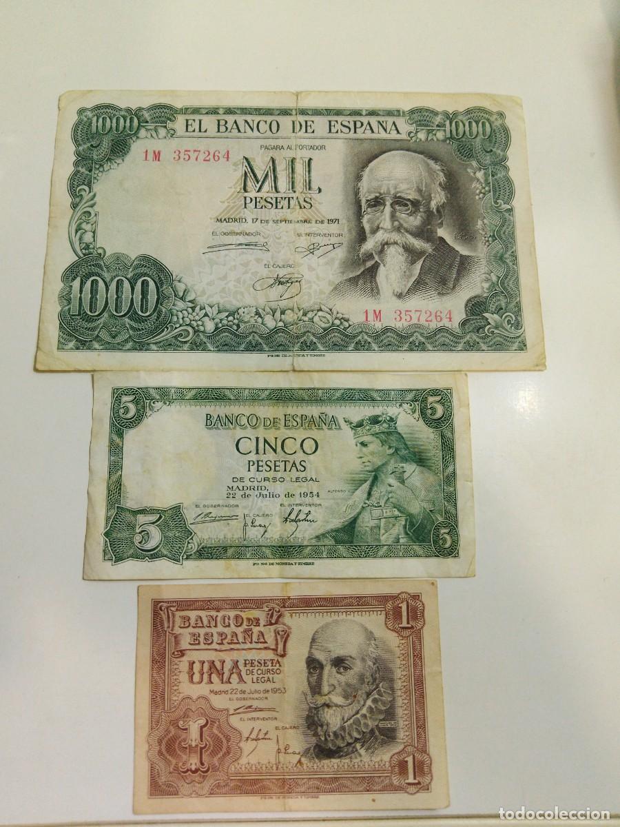 Billetes espa&ntilde;oles: 3 billetes espa&ntilde;oles 1000 pesetas, 5 pesetas , 1 peseta.