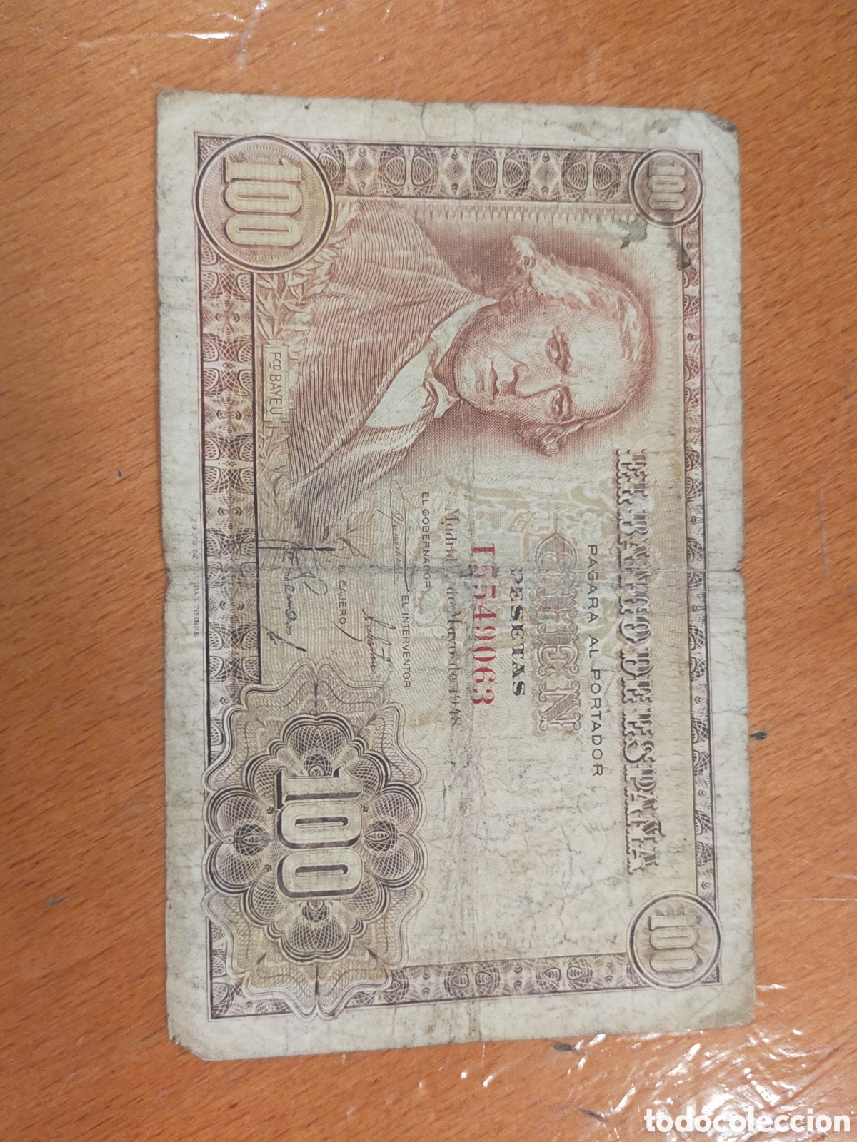 Billetes espa&ntilde;oles: billete antiguo de 100 pesetas del Banco de Espa&ntilde;a, emitido en Madrid el 2 de mayo de 1948