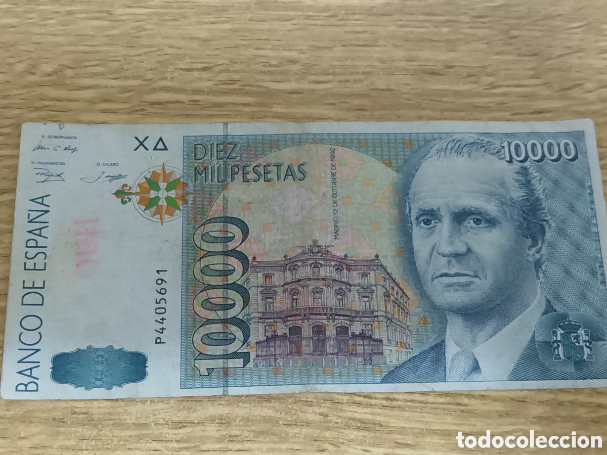 Notas espanholas: BILLETE DE 10000 PESETAS DEL 12 DE OCTUBRE DE 1992 SERIE P4405691