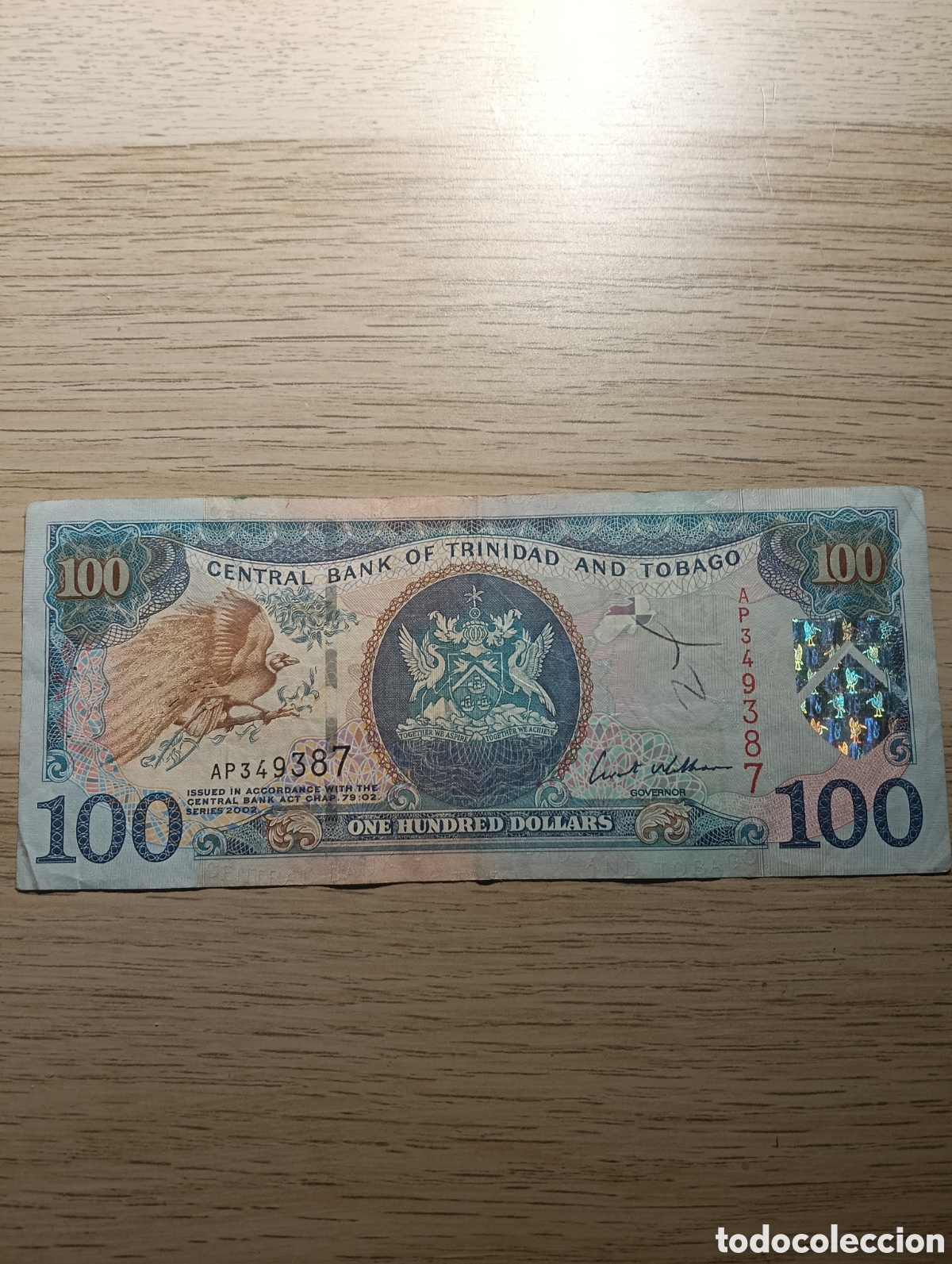 Billetes extranjeros: 100 Dollars Trinidad and Tobago. Garabatos.