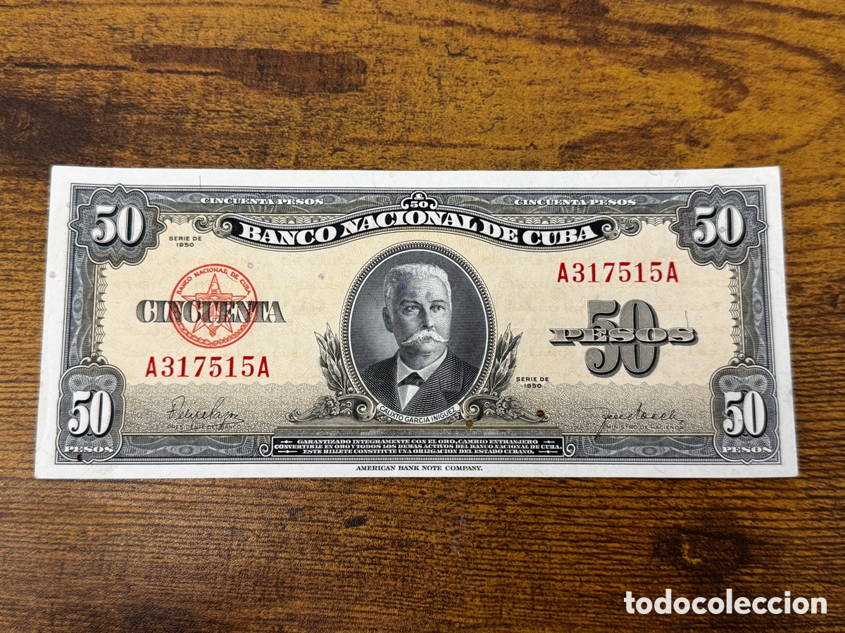 Billetes extranjeros: Billete de 50 pesos 1950 Cuba. No circulo, pero muestra se&ntilde;ales de humedad y agujeros de traza