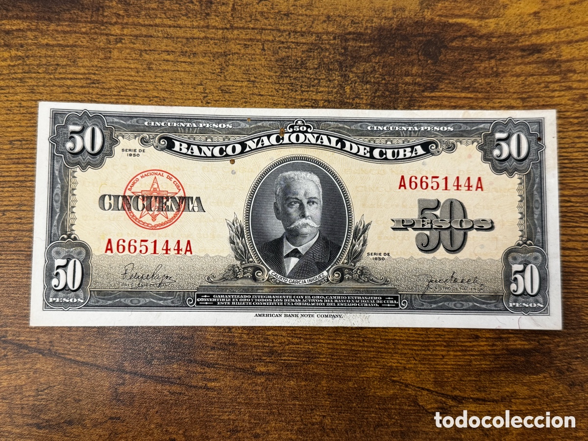 Billetes extranjeros: Billete de 50 pesos 1950 Cuba. No circulo, pero muestra se&ntilde;ales de humedad y agujeros de traza