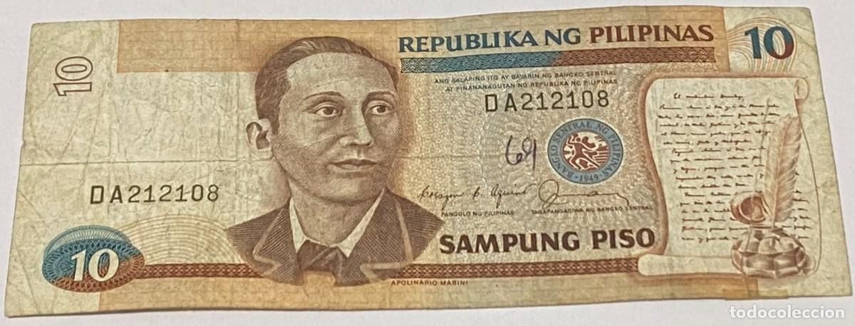 Billetes extranjeros: Billete 1990. 10 Piso. Filipinas. Apolinario Masini. Iglesia de Barasoain. P-169b. MBC-. Firmas: C.