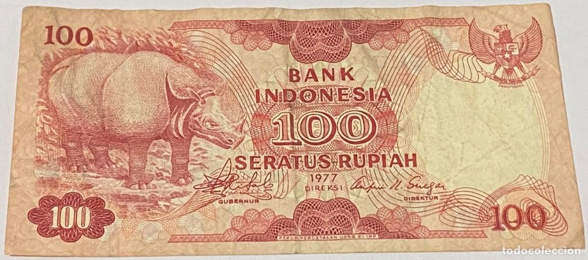 Billetes extranjeros: Billete 1977. 100 Rupia. Indonesia. P-116. MBC-. Rinoceronte. Muy Buena Conservaci&oacute;n -. Firmas: Rach