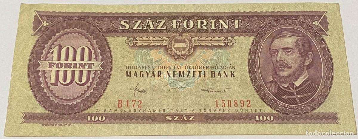 Billetes extranjeros: Billete 1984. 100 Forint. Budapest, Hungr&iacute;a Comunista. MBC. Muy Buena Conservaci&oacute;n. Carro caballos.