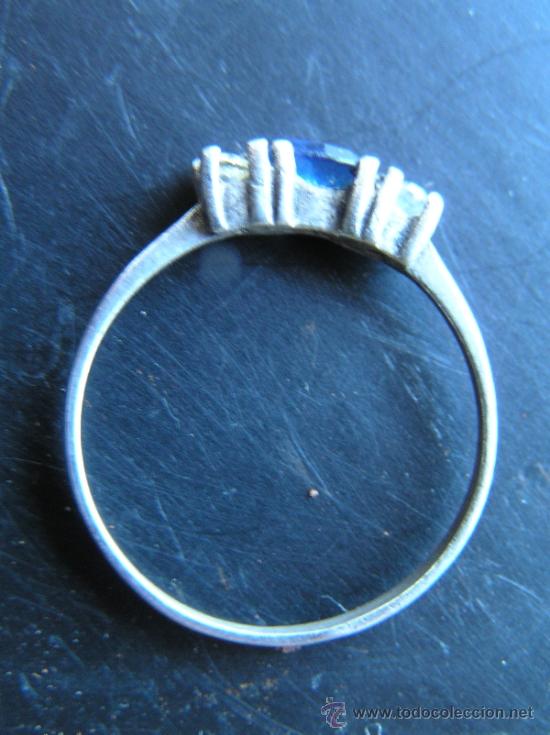 Joalharia: Anillo de Plata contrastada con tres cristales ( Azul central y transparentes a los lados )