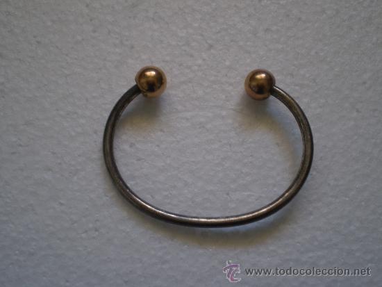 PULSERA EN PLATA? Y METAL DORADO.