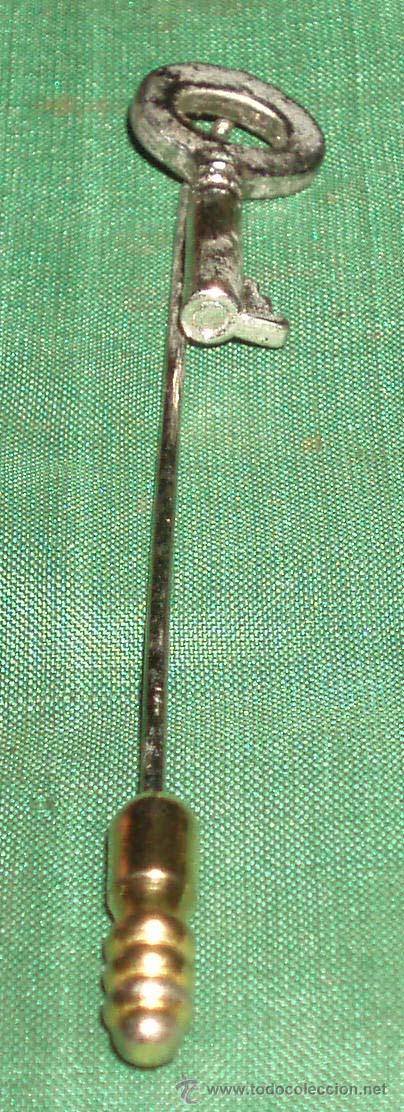 Gioielleria: bonito alfiler en forma de llave