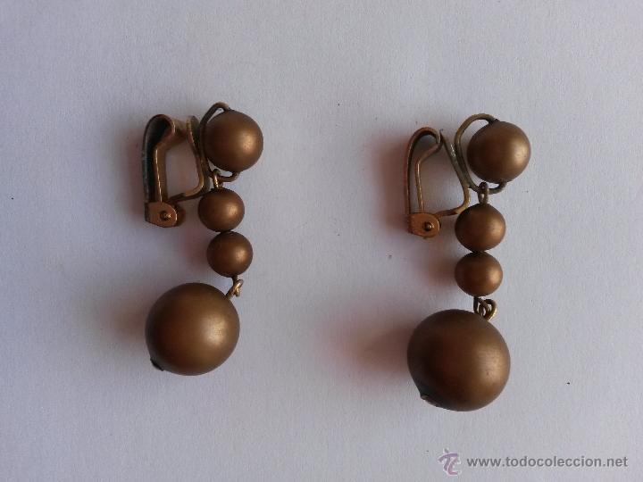 Joyeria: Pendientes vintage a&ntilde;os 60 sin uso sacados del papel