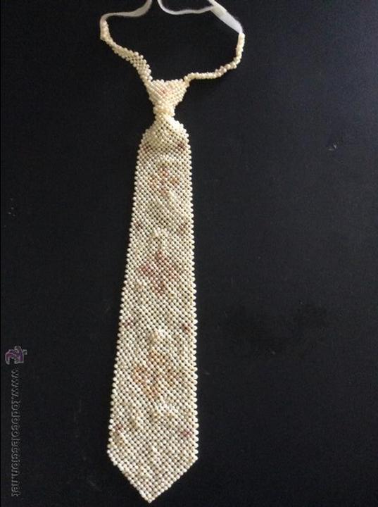 Joaillerie: Corbata de las perlas cultivadas