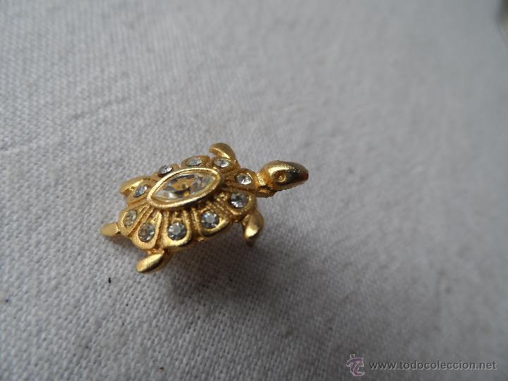 Gioielleria: tortuga broche dorado con piedras tipo pins