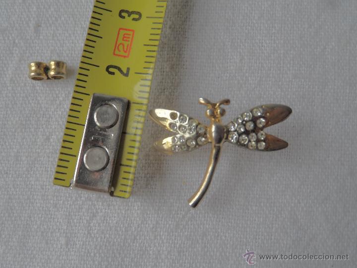 Gioielleria: broche libelula dorado con piedras tipo pins