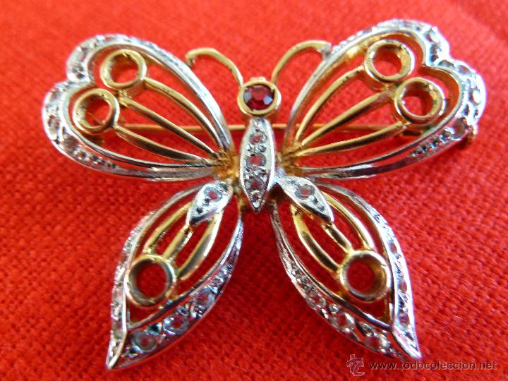 Joyeria: broche chapado oro y plateado en forma de mariposa con brillantes circonitas y zafiro