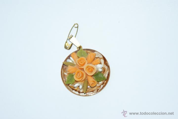 Joalharia: colgante vintage con flores