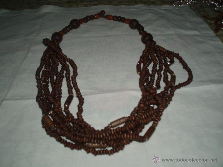 Gioielleria: collar de madera 8 tiras con anillas peque&ntilde;as de madera