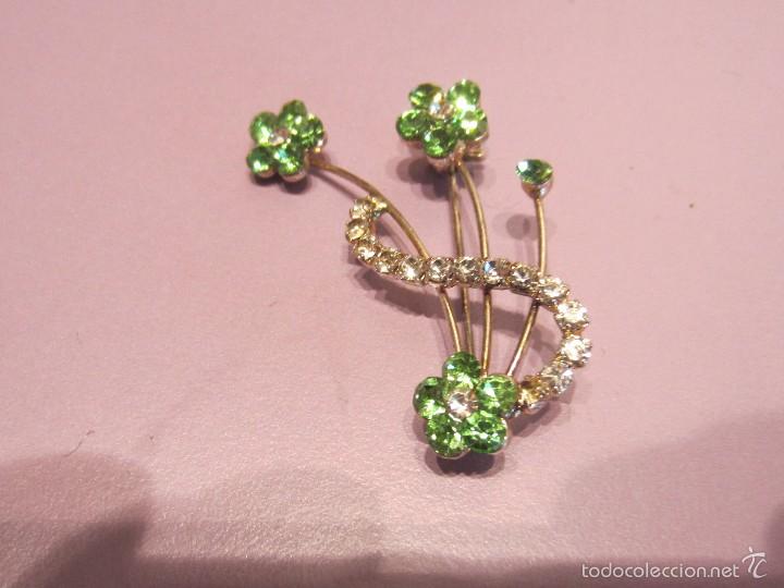 Joaillerie: broche aguja con piedras