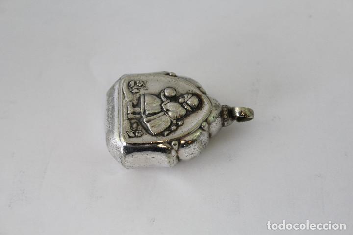 Joaillerie: sonajero plateado