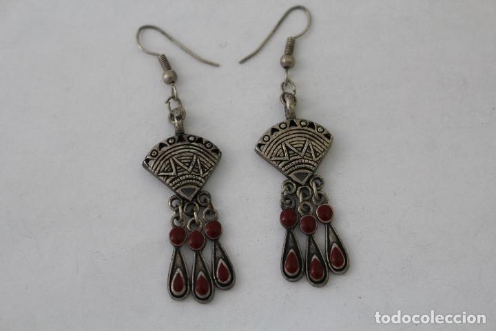 Joaillerie: pendientes en plata de ley con piedras rojas