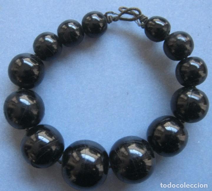 Joaillerie: ANTIGUA PULSERA S&Iacute;MIL AZABACHE S.XIX