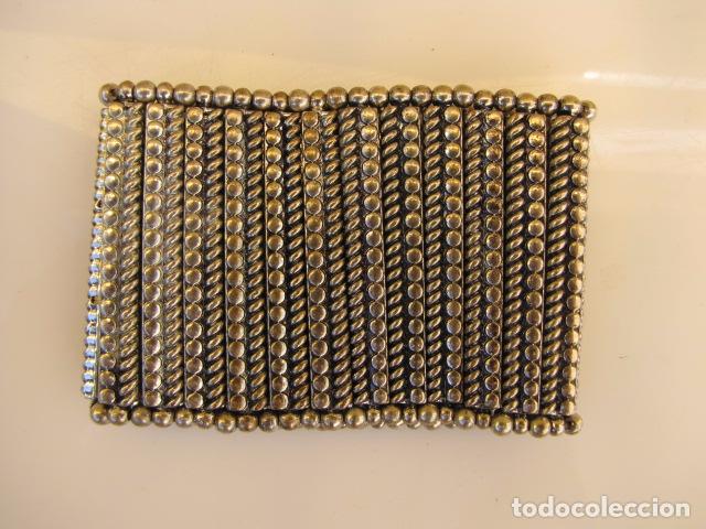 Joaillerie: Pulsera Mu&ntilde;equera en metal plateado. El&aacute;stica