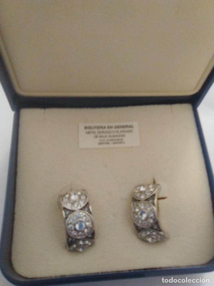 Joyeria: pendientes chapados en oro blanco