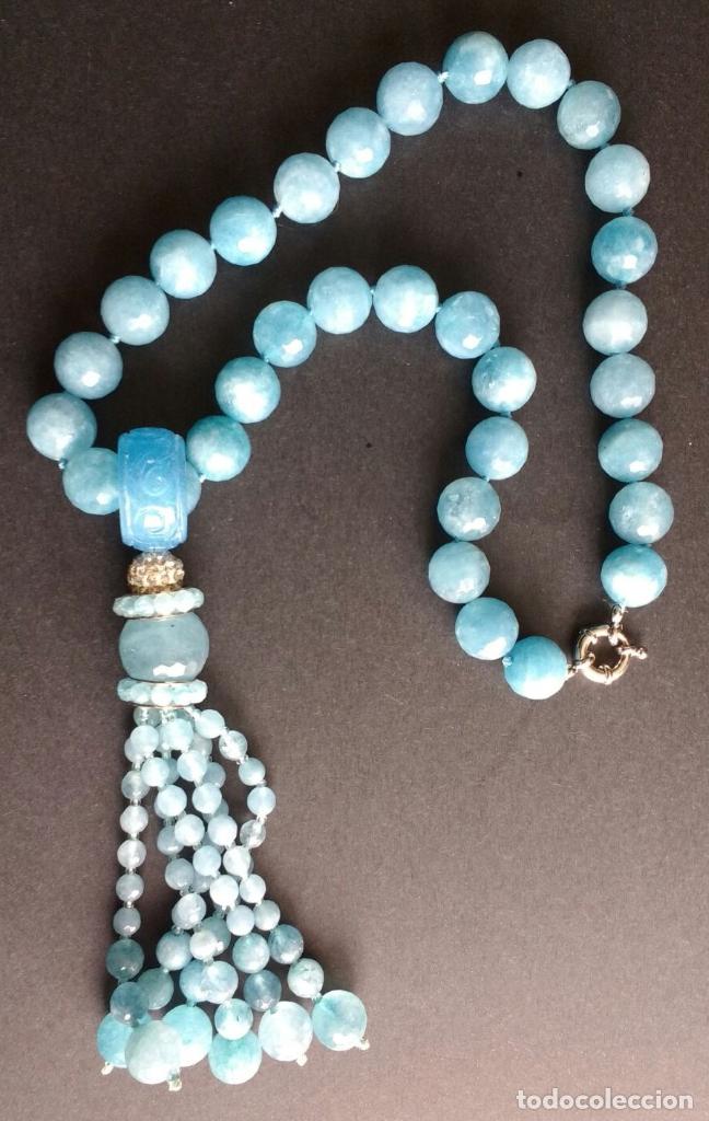 Schmuck: Collar &aacute;gata con borla.