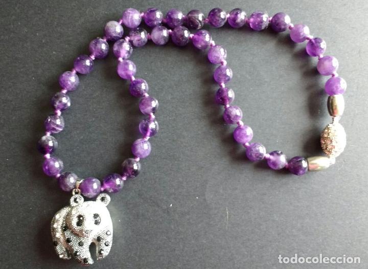 Joaillerie: Collar amatista con oso.