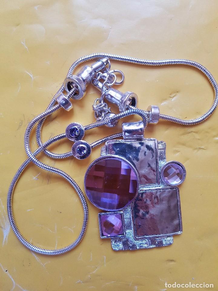 Schmuck: COLGANTE EN METAL Y CRISTAL COLOR MORADO DE ELEGANTEDISE&Ntilde;O