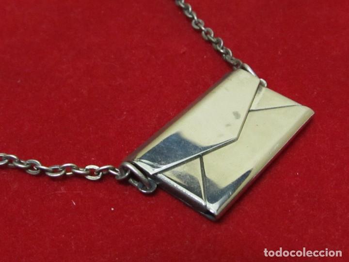 Joyeria: COLGANTE CARTERA MET&Aacute;LICA - Foto 1