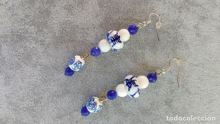 Schmuck: pendientes bolas de coral natural/piezas de porcelana