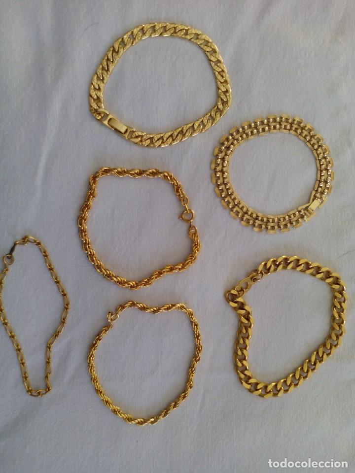 Joyeria: seis pulseras de metal dorado - Foto 1