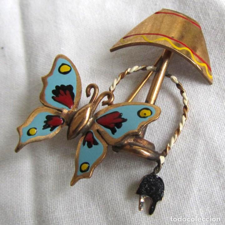 Gioielleria: Precioso broche con forma de l&aacute;mpara el&eacute;ctrica con mariposa