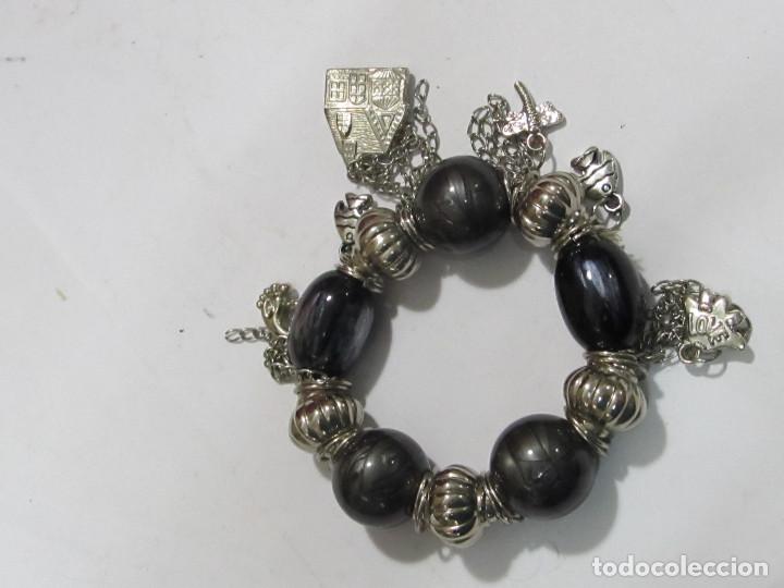 Joyeria: PULSERA PLATEADA EL&Aacute;STICA CON COLGANTES - Foto 1