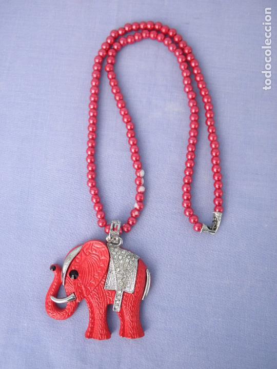 Joyeria: Collar rojo con colgante de elefante - Foto 1