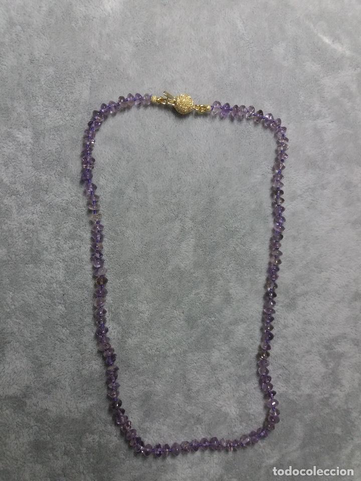 Joyeria: collar de amatista en disco con cierre de plata con ba&ntilde;o de oro con contraste