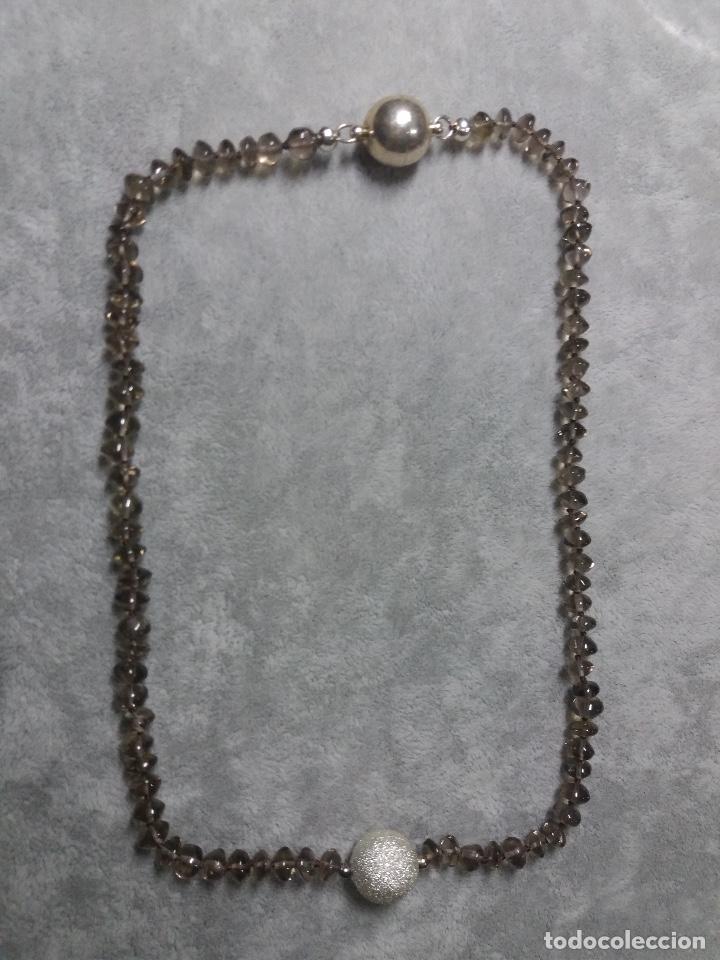 Gioielleria: collar de cuarzo ahumado en disco/bisuter&iacute;a