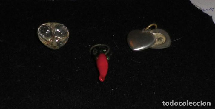 Schmuck: tres colgantes variados
