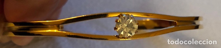 Joyeria: Preciosa pulsera-esclava chapada en oro, y cristal en forma de brillante