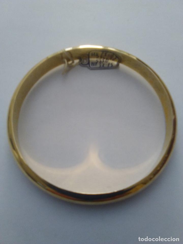 Joyeria: brazalete de plata chapado en oro
