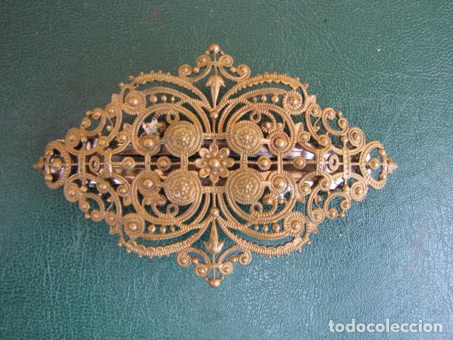 Joyeria: Recogepelo  coletero en bronce. Made in France. 8 cm