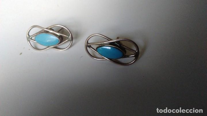 Joyeria: Pareja de pendientes de plata con contraste 925, con piedra azul central