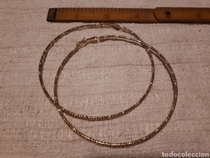 Joaillerie: Pendientes aro grande metal dorado
