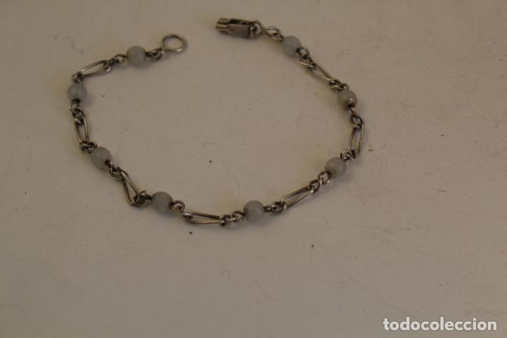 Schmuck: pulsera ni&ntilde;a de quarzo blanco y plata