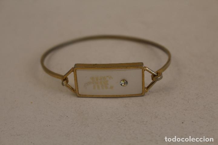 Joyeria: pulsera chapada en oro con nacar