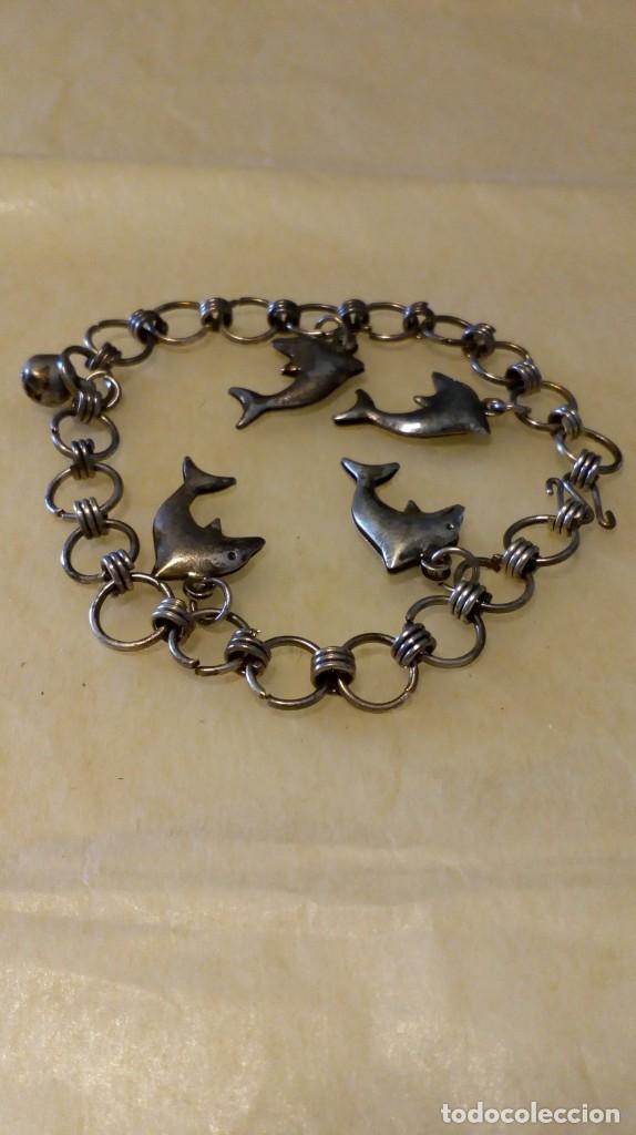 Joyeria: Pulsera plateada de delfines - Foto 2
