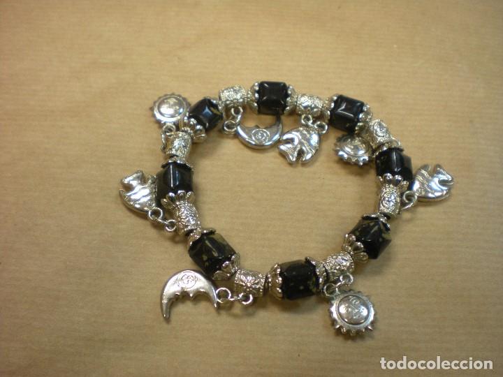 Joyeria: PULSERA EXTENSIBLE CON DETALLES COLGANTES - Foto 1