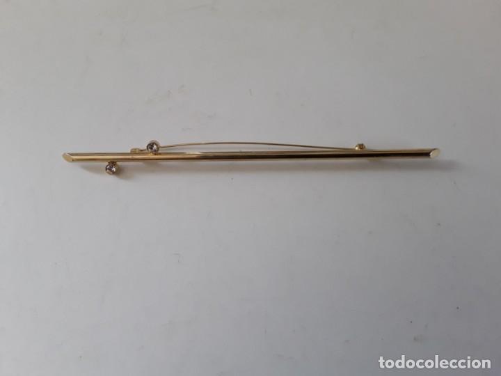 Joyeria: Broche a&ntilde;os 20 de metal dorado con dos circonitas