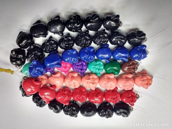 Gioielleria: TIRAS CABEZAS DE BUDA DE COLORES EN RESINA.