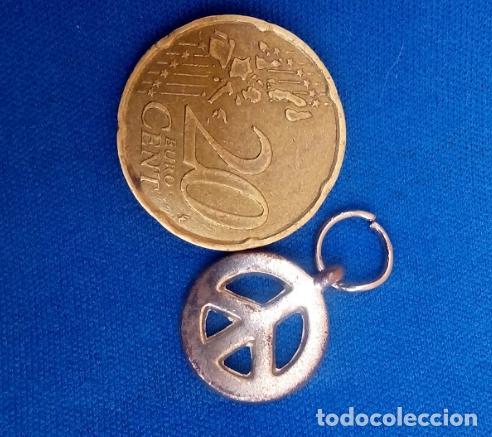 Joaillerie: COLGANTE amuleto- simbolo de la paz